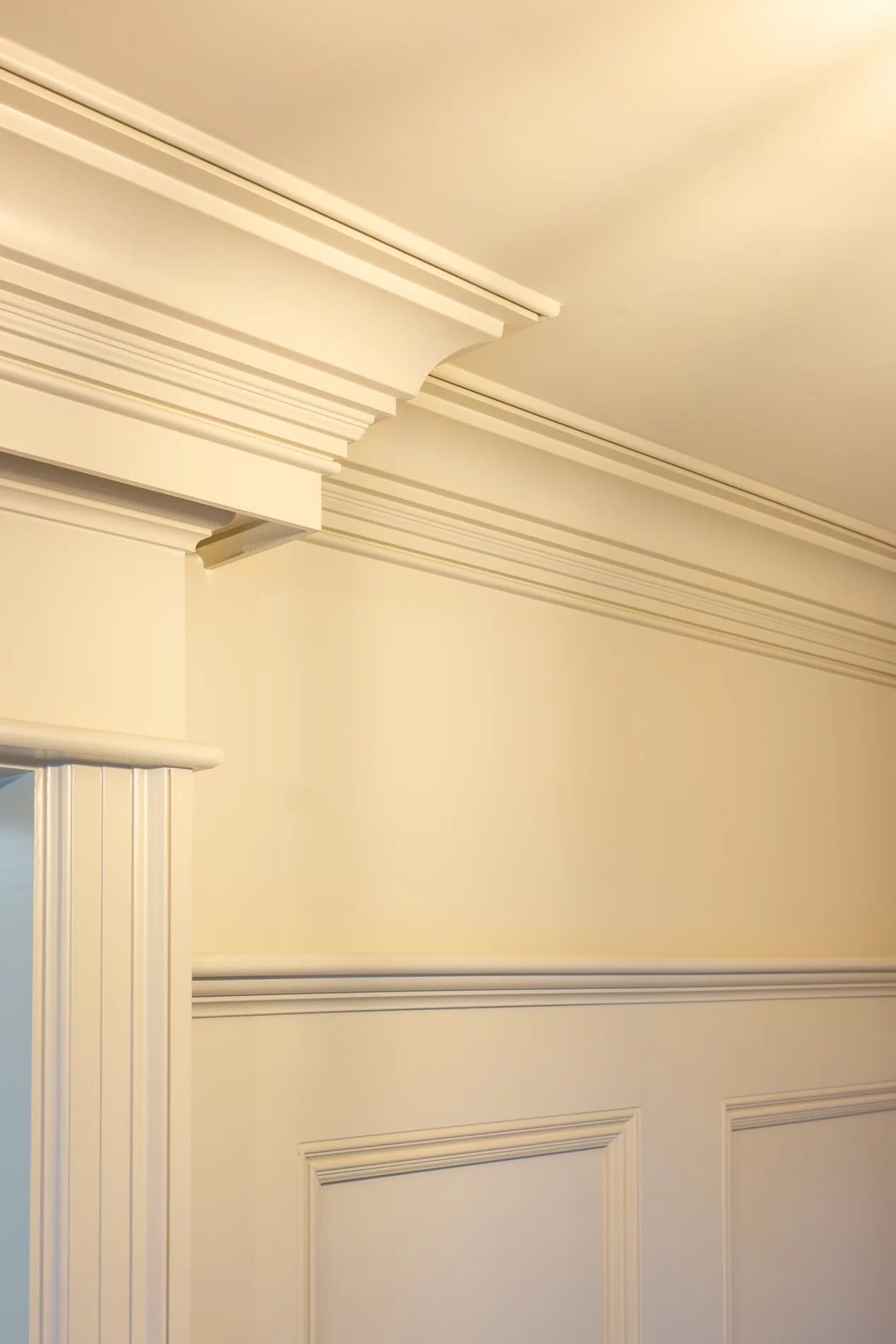 Layered painted crown, door casing and panel molding