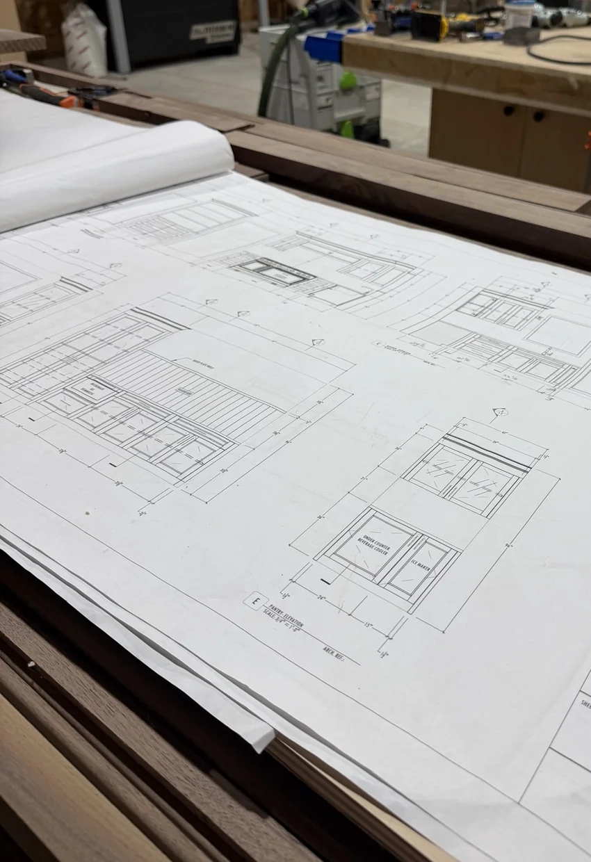 Architectural drawings reviewed in the Stimis shop
